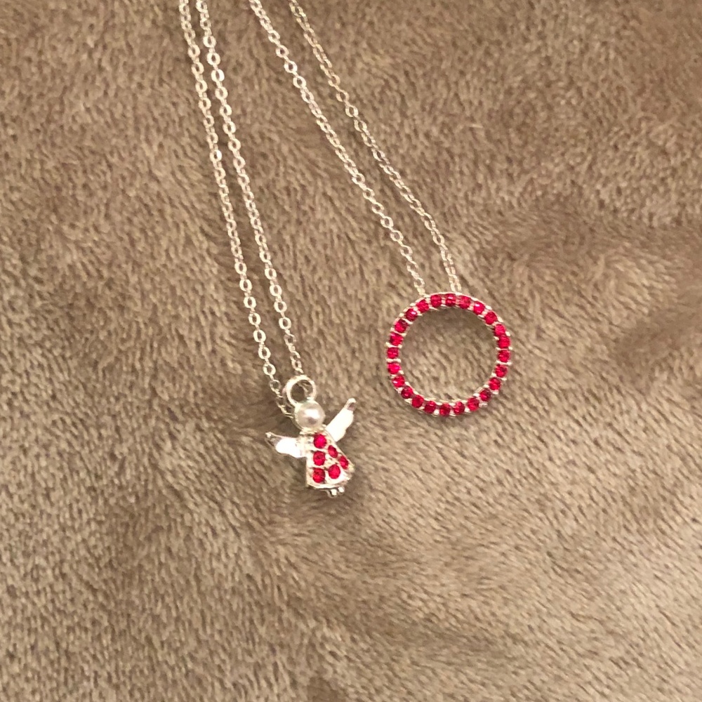 AVON RUBY ANGEL/CIRCLE NECKLACE